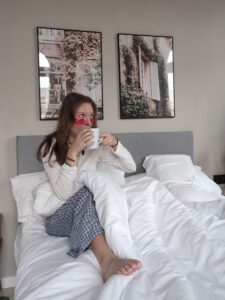 morning routine in bed with eye patches in Limehome apartment